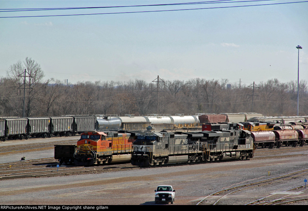 BNSF 5872  and other's sit in the yard,